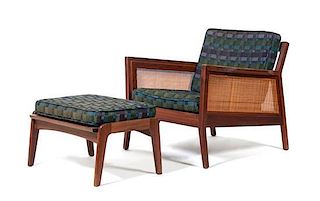 A Mid-century Armchair with Associated Ottoman Height 29 inches.