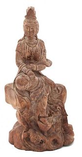 A Carved Wood Figure of Guanyin Height of figure 15 inches.