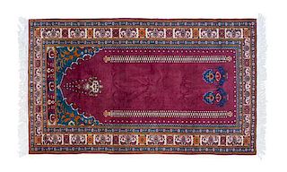 A Persian Prayer Rug 6 feet 4 inches x 3 feet 9 inches.