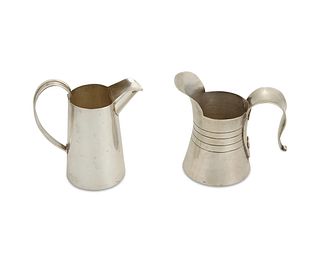 Two William Spratling sterling silver cream jugs