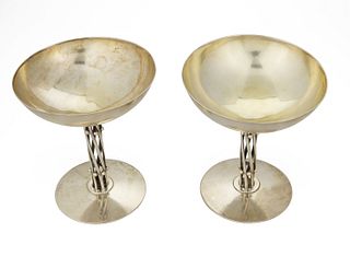 A pair of William Spratling sterling silver champagne goblets
