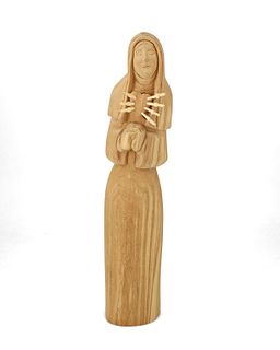 A carved wood Nuestra Senora de Dolores, by Victoria Garcia Parrett