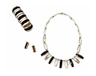 A group of Enrique Ledesma silver and obsidian jewelry