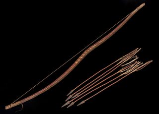 A 19TH C. PLATEAU SINEW BACKED BOW WITH ARROWS