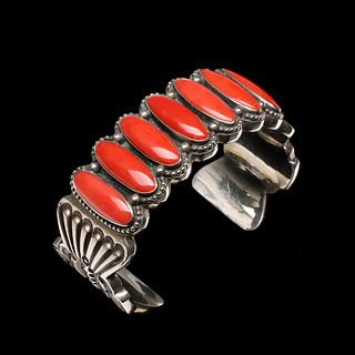 AN ERNEST BEGAY HEAVY STERLING CUFF WITH CORAL