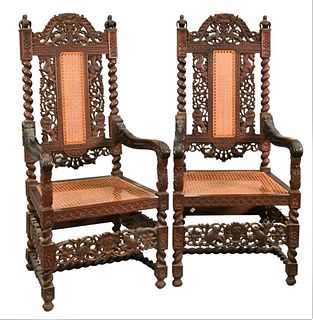 A Pair of Anglo Indian Carved Hardwood Armchairs