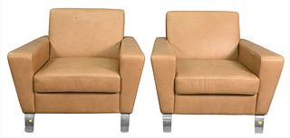 A Pair of Leather Upholstered Armchairs