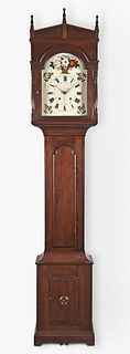 An 8 day mid 19th century walnut Pennsylvania tall clock with Black Forest movement