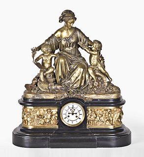 A large and impressive French figural mantel clock