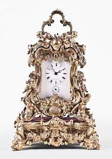 A large and extremely ornate rococo style repeating carriage clock with base signed Oudin