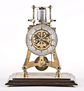 A 20th century skeleton clock with chronometer escapement by E.J. Dent & Co. Ltd. London