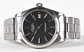A man's Rolex ref 1500 Oyster Perpetual Date wrist watch
