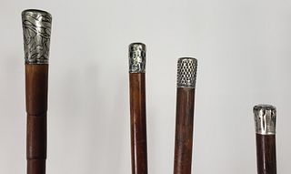 Four Antique Sterling Silver Knob Walking Sticks, 19th century
