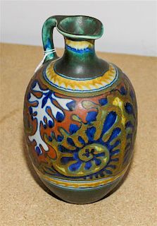 * A Gouda Pottery Ewer Height 8 1/4 inches.