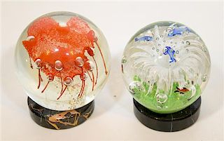 * Two Glass Paperweights. Height of taller 4 1/2 inches.