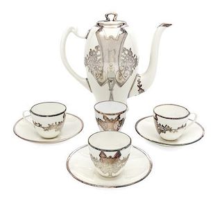 * An English Silver Overlay Porcelain Partial Coffee Service Height of coffee pot 7 1/2 inches.
