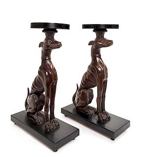 A Pair of Mahogany and Ebonized Whippet Stands Height 23 5/8 inches.