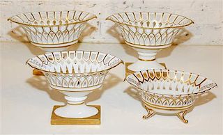 A Collection of Four Gilt Painted Porcelain Baskets Height of pair 8 1/4 x width 12 inches.