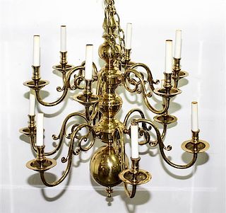 A Pair of Dutch Baroque Style Brass Twelve Light Chandeliers Diameter 30 1/4 inches.