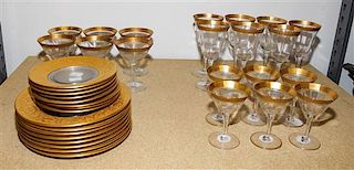 A Partial Set of Glass Dinnerware Height of tallest goblet 6 5/8 inches.