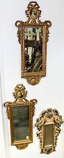 * A Pair of Italian Carved and Silvered Mirrors Height of pair 24 x width 13 inches.