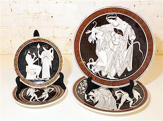 * Four Greek Porcelain Plates. Diameter of largest 13 1/4 inches.