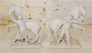 * A Pair of KPM Blanc de Chine Equestrian Groups. Height 8 inches.