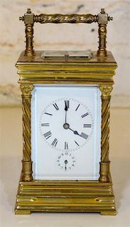 * A French Carriage Clock Height 8 1/4 inches.