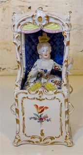 * A Continental Porcelain Figural Group Height 11 inches.