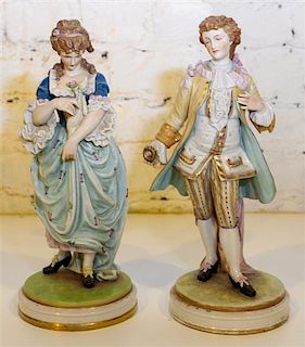 * A Pair of German Porcelain Figures. Height 12 1/2 inches.