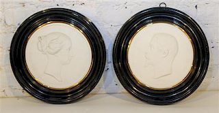 * A Pair of Bisque Profile Medallions, Napoleon III and Eugenie Diameter 9 inches.