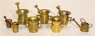 * Eight Brass Diminutive Articles. Height of tallest 2 inches.