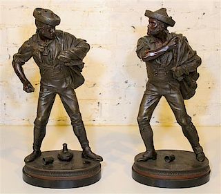 * A Pair of Continental Cast Metal Figures. Height 20 3/4 inches.
