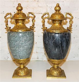 * A Pair of Contemporary Gilt Metal Mounted Neoclassical Urns. Height 28 1/2 inches.