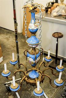 * A Sevres Style Eight-Light Chandelier. Height 35 inches.