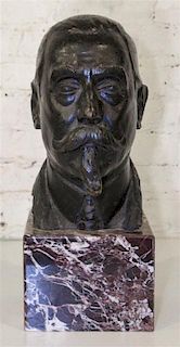 * A Continental Bronze Bust. Height of bronze 13 1/4 inches.