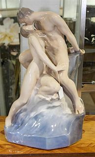 * A Royal Copenhagen Figural Group. Height 18 1/2 inches.
