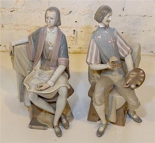 * A Pair of Lladro Figures. Height 14 1/4 inches.