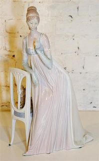 * A Lladro Figure. Height 19 inches.