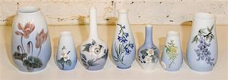 * Seven Bing & Grondahl Porcelain Floral Decorated Vases. Height of tallest 7 1/2 inches.