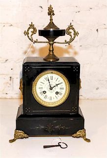 A French Slate and Gilt Metal Mounted Mantle Clock. Height 16 3/4 inches.