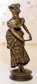 * A Victorian Bronze Figure. Height 6 1/4 inches.