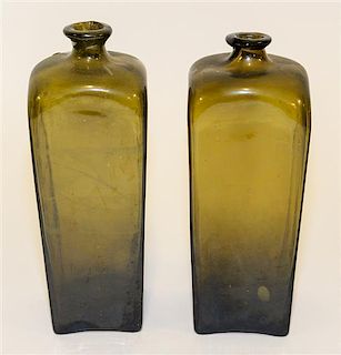 A Pair of English Green Glass Gin or Case Bottles Height of taller 10 1/4 inches.