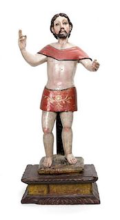 A Central American Carved and Polychrome Wood Figure Height 34 inches.