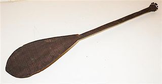 A Carved Wood Oar Length 37 1/4 inches.