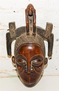 * A Guro Wood Mask. Height 14 1/2 inches.