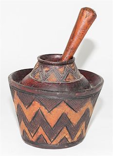 * A Bobo Carved Wood Mortar & Pestle. Diameter 8 1/2 inches.