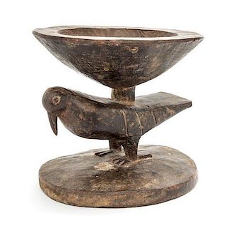 * A Baule Carved Wood Bird Form Drinking Cup. Height 5 3/4 x diameter 6 inches.