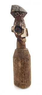 * An African Carved Wood Yaka Pounder, Congo Height 23 x diameter 4 1/2 inches.