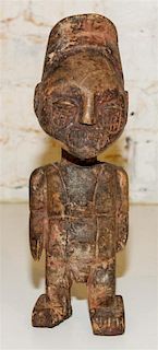 * A Carved Wood Figure. Height 11 1/2 inches.